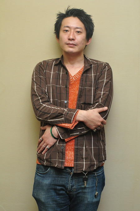 谷賢一